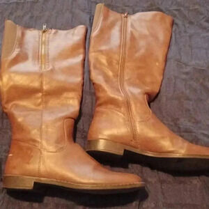 Pink and pepper boots with multiple zippers